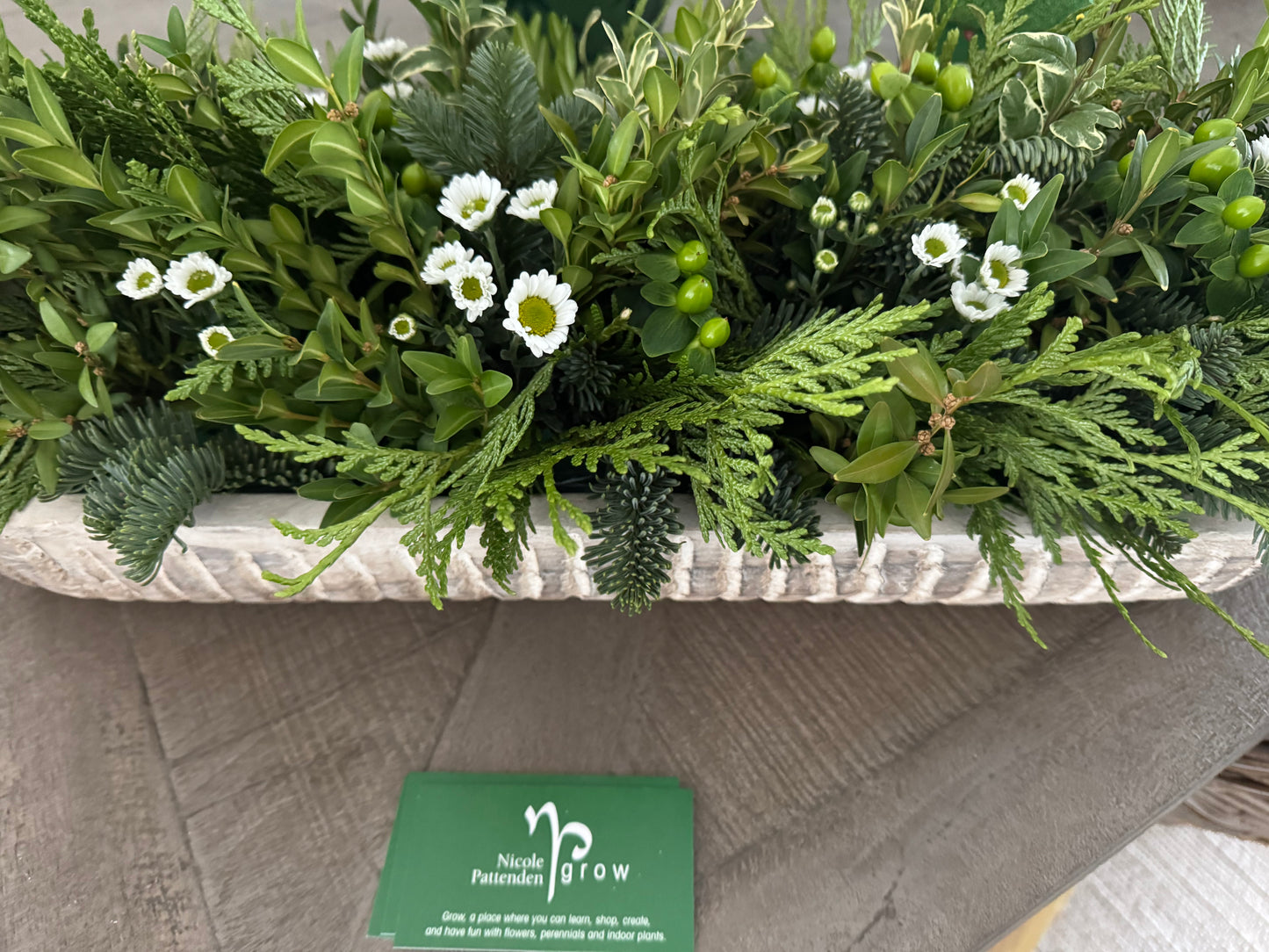 Winter Greenery With Pretty White Little Flowers