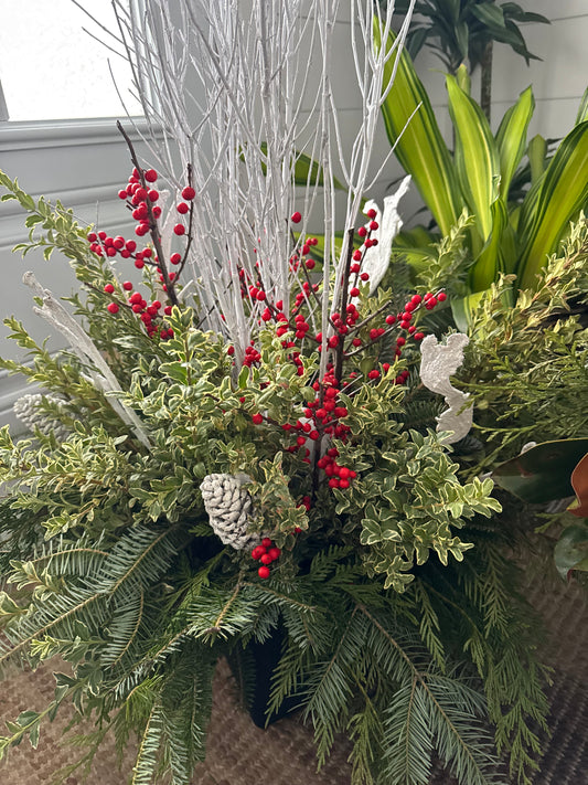 Winter Container with Red Berries and White Sticks